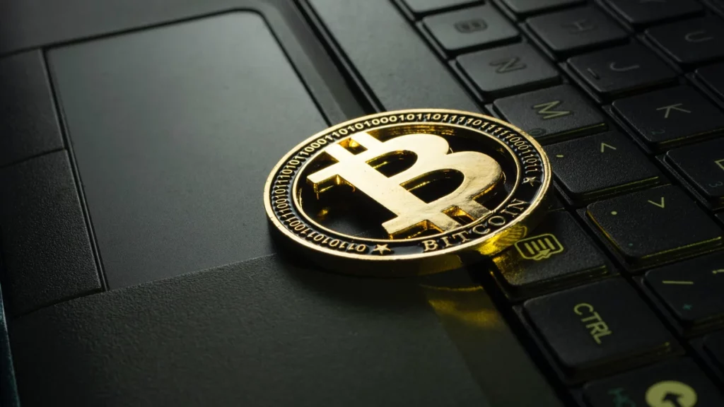 bitcoin on a black keyboard